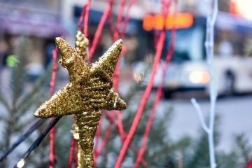 Holiday decoration and Metro bus behind